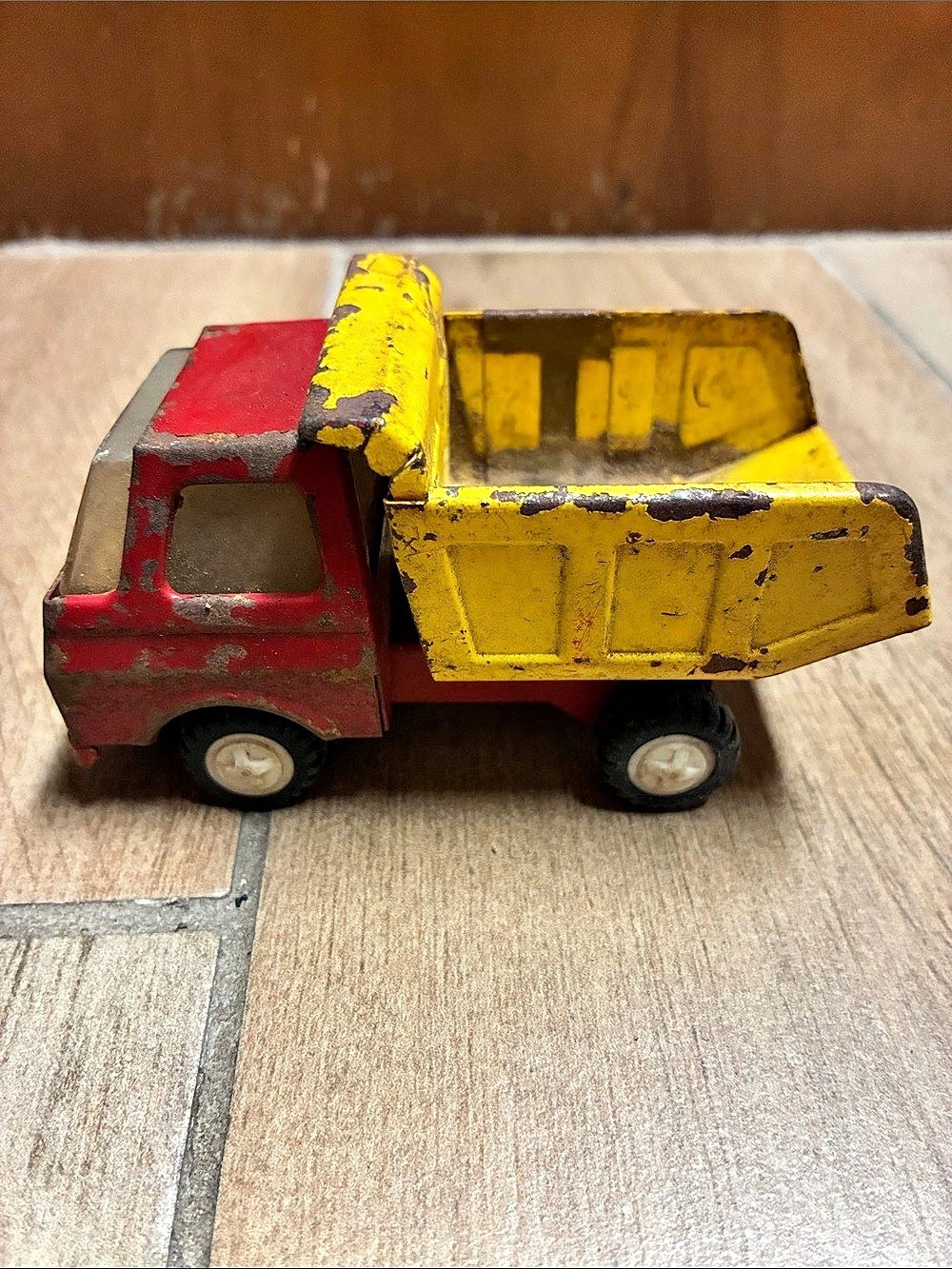 Vintage Die-Cast red and yellow Dump Truck